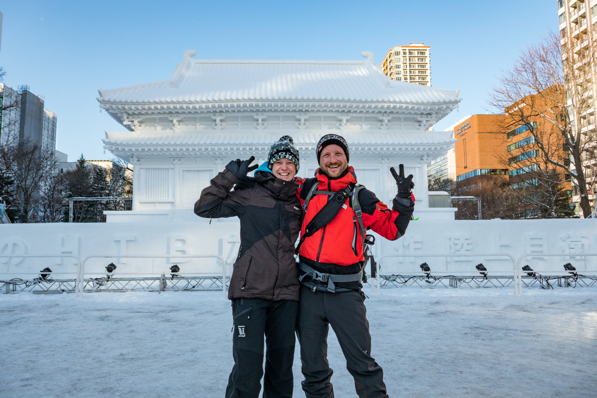 us in front of a huge snow temple at the Sapporo Snow and Ice Festival