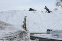 snow depot: this huge snow mountain is built up from snow removed from streets, parking areas,...