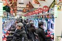 one of the many Pachinko halls. Pachinko is a Japanese pinball game. The noise level inside these halls is 4000