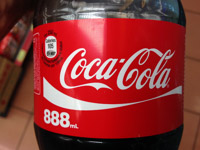 as the 8 is a lucky number in Chinese it is no wonder that a Coke bottle contains 888mL ;-)